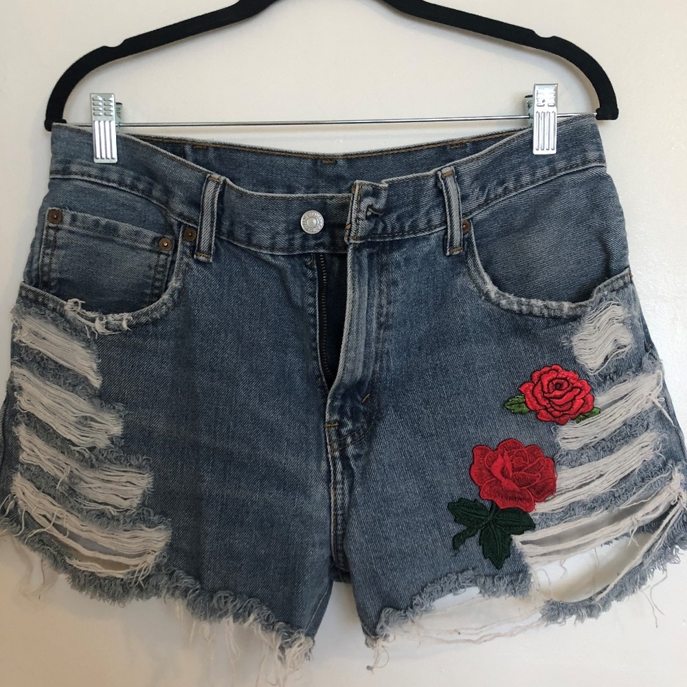 Distressed Rose high-waist Levi’s jean shorts